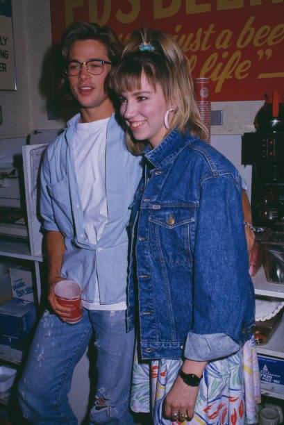 Brad Pitt posing with pop singer Debbie Gibson in 1988.